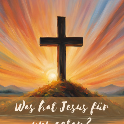Ein Kreuz vor einem Sonnenuntergang
